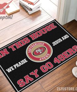In this house we praise jesus and say go 49ers doormat