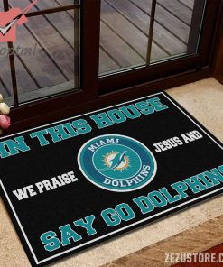 In this house we praise jesus and say go Dolphins doormat