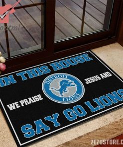 In this house we praise jesus and say go Lions doormat